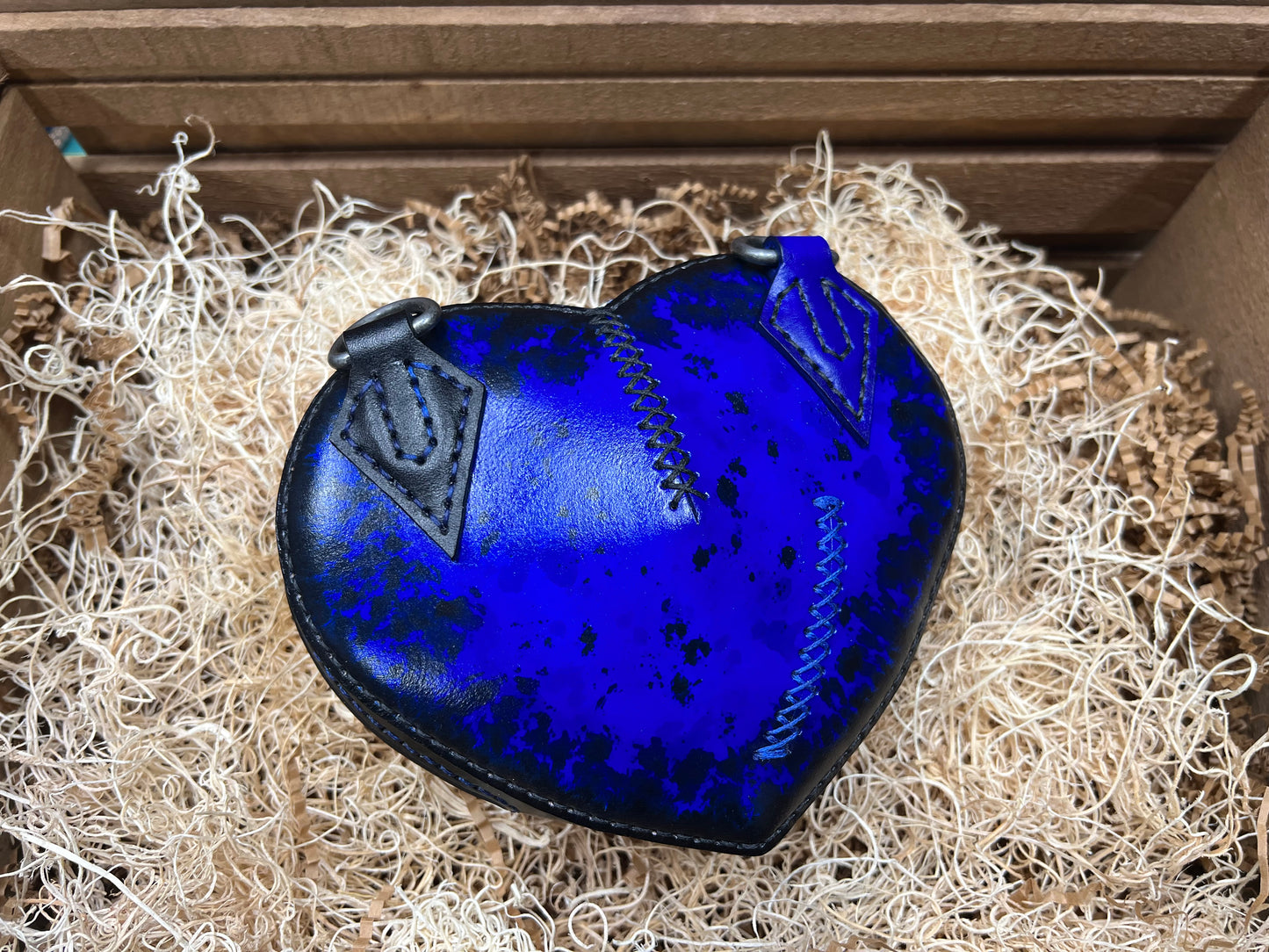 Broken heart leather handbag