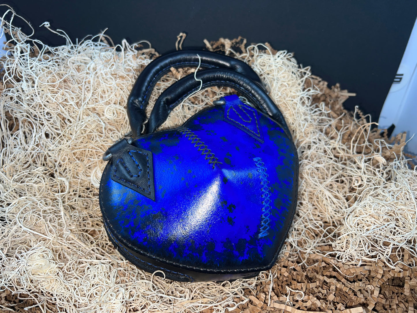 Broken heart leather handbag