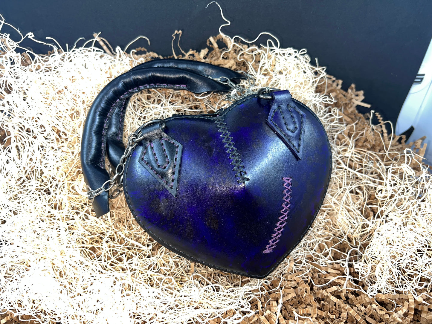 Broken heart leather handbag